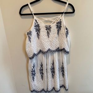 White dress with navy embroidery